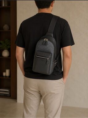 Coach Black Leather Sling Backpack with Silver Hardware